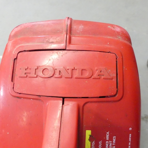 302 - A Honda F110 Rototiller.