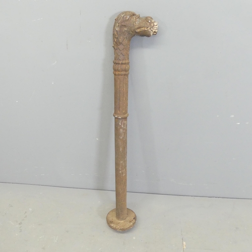 303 - A cast iron pipe, in the form of a dragon head. Height 86cm.