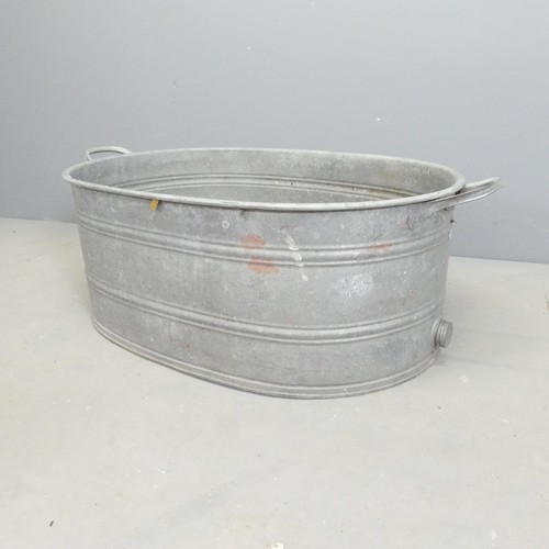 309 - A vintage galvanised wash basin. 85x30x50cm.