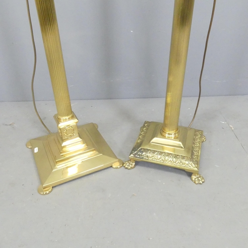 2575 - Two similar brass Corinthian column standard lamps. Tallest height to bayonet 142cm.