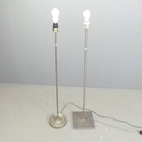 2576 - Two modern brushed steel standard lamps. Tallest overall 133cm.