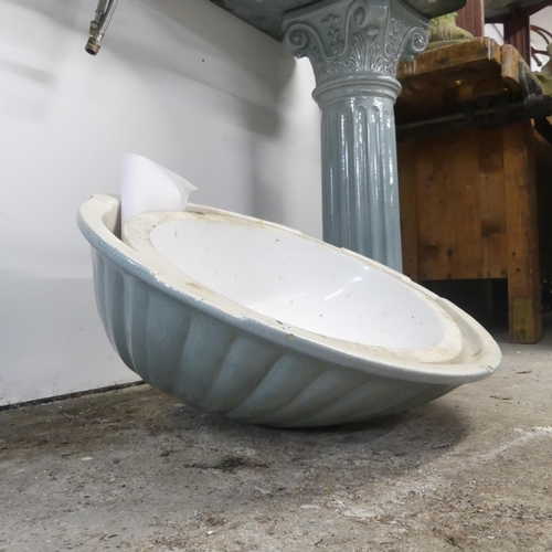 2583 - A large architectural marble topped sink, raised on two ceramic columns, and a large Grecian design ... 