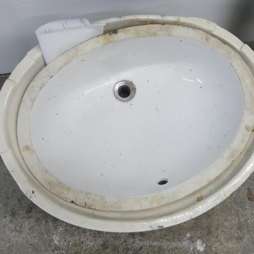 2583 - A large architectural marble topped sink, raised on two ceramic columns, and a large Grecian design ... 