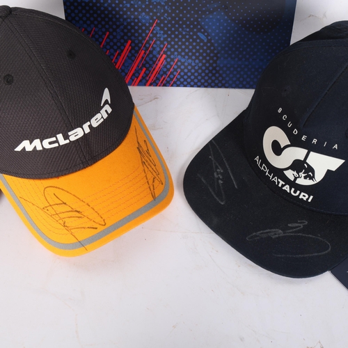 97 - A McLaren 2018 driver's peaked cap, signed by Fernando Alonso and Stoffel Vandoorne, and a 2018 Alph... 