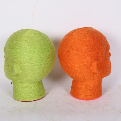 98 - 2 polystyrene string-bound busts in green and orange, H27cm