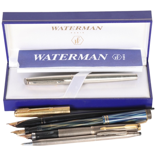 251 - A group of various pens, including a boxed Waterman, a Canadian Lucky Curve fountain pen with gold n... 