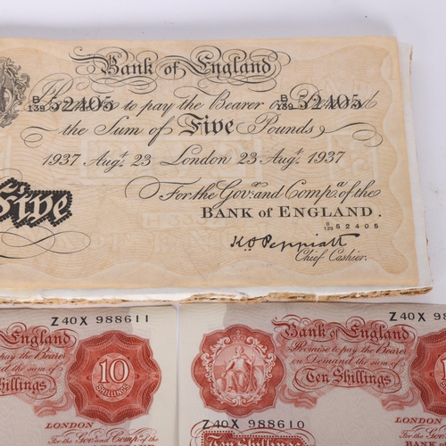 255 - A 1937 white £5 note, and 3 10 shilling notes