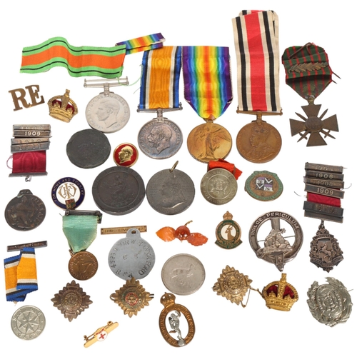 256 - First World War medals to Pte AJ Jones S.A.I, and a number of other medals, coins and badges, Croix ... 