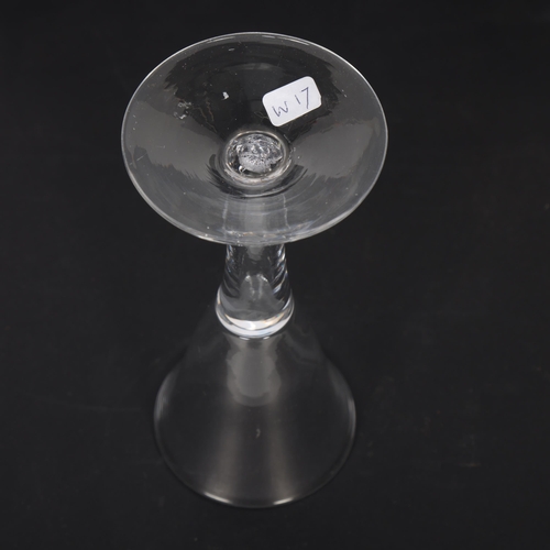 261 - An 18th century moulded wine glass, of conical tapered form, H15.5cm