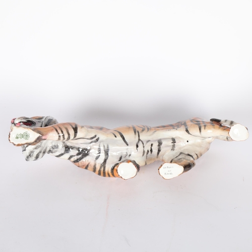 262 - ROYAL DOULTON - a large ceramic study of a prowling tiger, L34cm, HN2646