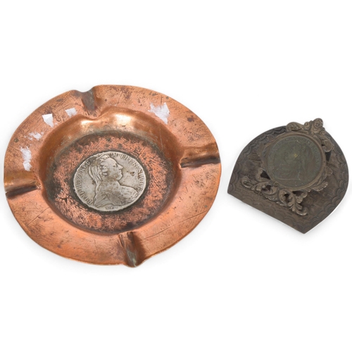 269 - A copper ashtray with an inset Maria Theresa thaler silver coin, and a horseshoe design letter clip ... 