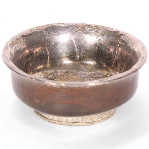 270 - An early 20th century Indian white metal and wood bowl