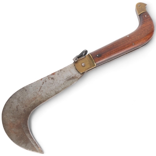 285 - A 19th century Whitby thatcher's folding knife, with brass mounts and rosewood handle, length 31cm