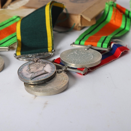 288 - A Second World War medal trio, awarded to Mr R J Spiers, all in original packing and boxed, a King G... 