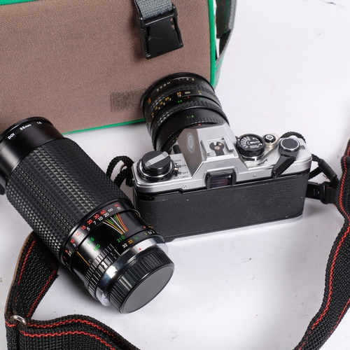 318 - An Olympus OM10 and associated Makimon MC zoom lens, an additional Sirius MC autozoom lens, a Canon ... 