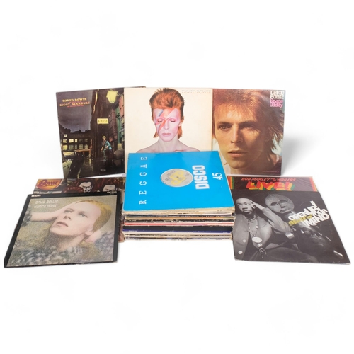 323 - A quantity of of vinyl LPs, various artists including David Bowie, Bob Marley and The Wailers, The M... 