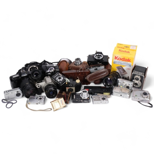 325 - A quantity of various Vintage cameras and equipment, including a Canon EOS650, a Canon EOS300, a Kod... 