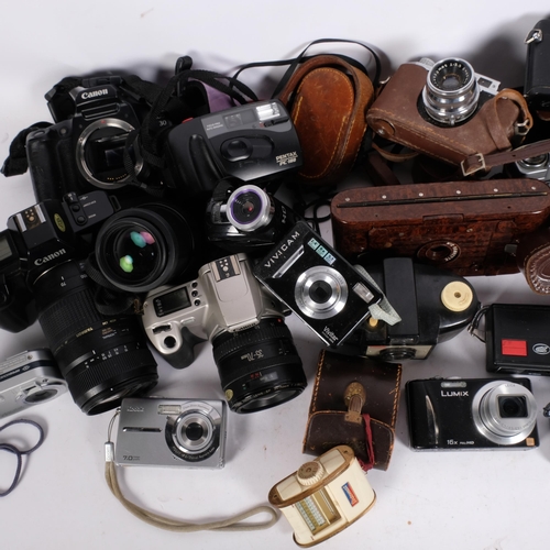 325 - A quantity of various Vintage cameras and equipment, including a Canon EOS650, a Canon EOS300, a Kod... 