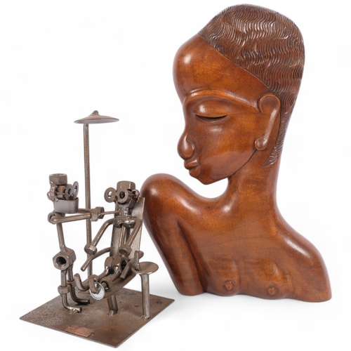 345 - A modern hardwood Tribal bust of a lady, H34cm, and a small brutalist style sculpture using nuts and... 