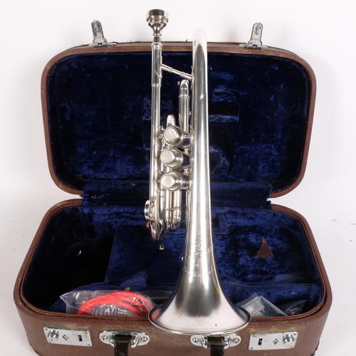 346 - A Besson silver plated cornet, serial no. 462945, in associated hardshell casing with additional acc... 