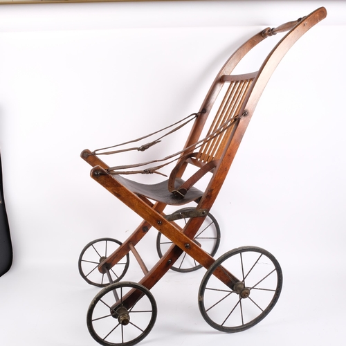 131 - A Vintage child's folding pushchair