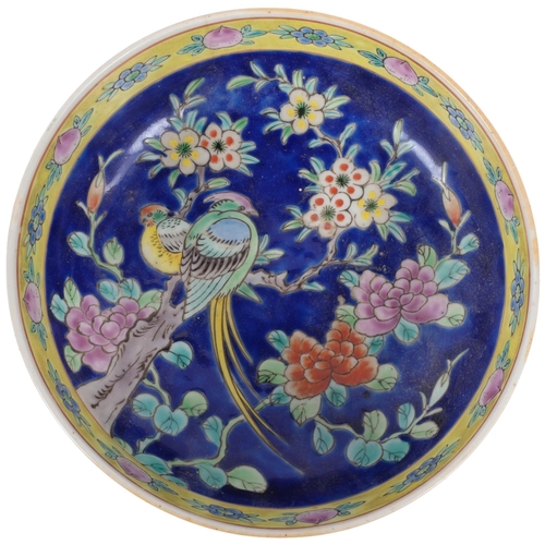 171 - A hand painted Oriental centrepiece bowl, with floral blue margined outer border, and similar floral... 