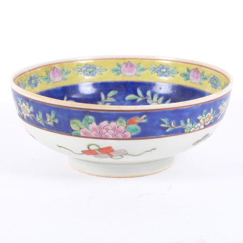 171 - A hand painted Oriental centrepiece bowl, with floral blue margined outer border, and similar floral... 