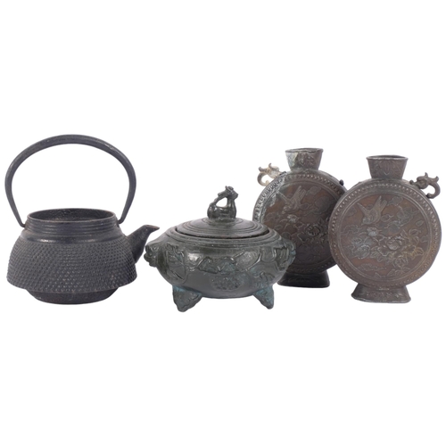 172 - A Japanese Tetsupin iron teapot (lacking lid), a pair of Japanese antimony moon flasks, and a small ... 