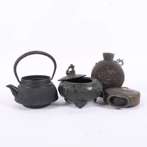 172 - A Japanese Tetsupin iron teapot (lacking lid), a pair of Japanese antimony moon flasks, and a small ... 