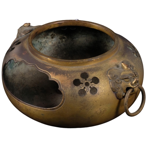 176 - A Chinese bronze censer with dog of faux ring handles, diameter 20cm