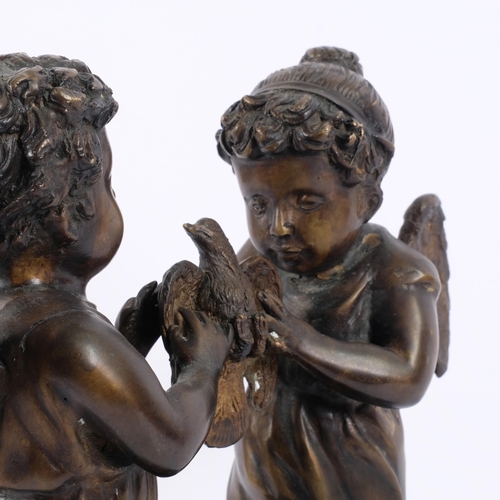 198 - A patinated spelter group of 2 cherubs, on stand, H31cm