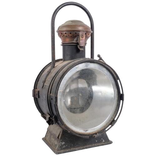 202 - A large early 20th century railway headlight lamp, H56cm