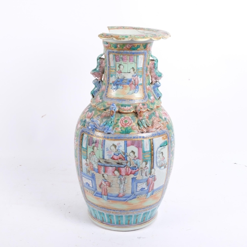 211 - A large Chinese famille rose vase, with applied dragon dog of fo decoration, 42.5cm