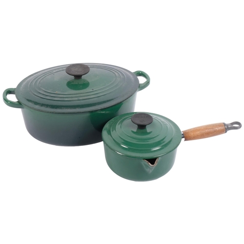 213 - A Le Creuset green enamelled 2-handled pot and cover, and matching saucepan and cover