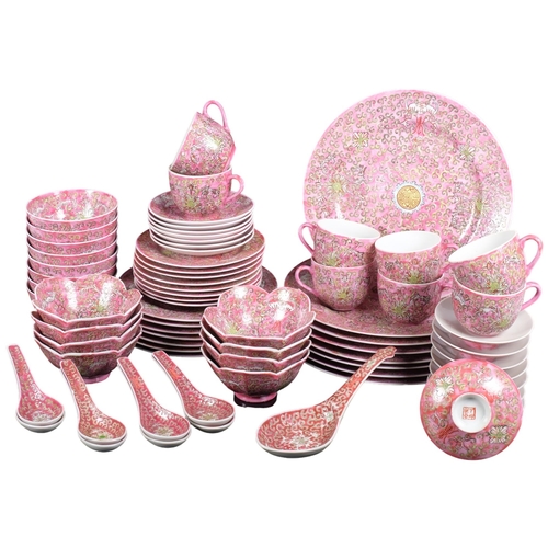 222 - An extensive Japanese pink ground dinner service for 8 people