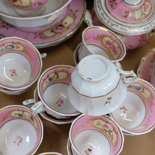 1018 - A Victorian porcelain teapot, sucrier and jug, and 17 cups, 11 saucers, 2 plates and slop bowl