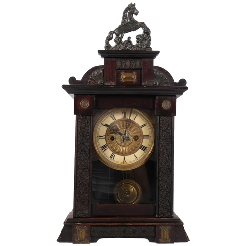 1030 - A brass dial 2-train mantel clock, in carved stained wood case with horse pediment, height overall 5... 