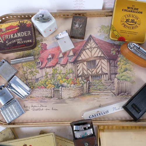 789 - A selection of Vintage lighters, including brands such as Ronson, and various spirit tins and associ... 