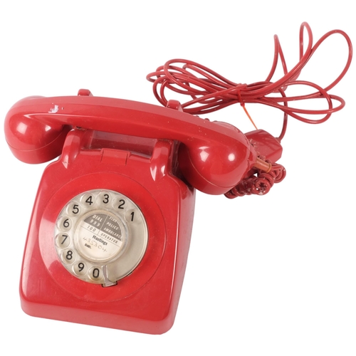 793 - A red plastic telephone