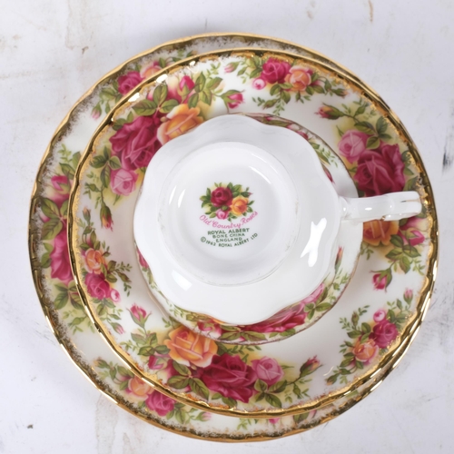 827 - Royal Albert Old Country Roses, an 8-piece tea service, including teapot, cups, saucers and side pla... 