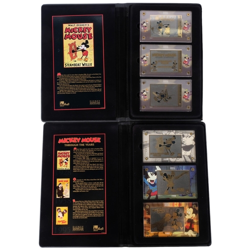 850 - Walt Disney's Mickey Mouse, a cased set of limited edition cards for Steamboat Willie, and a cased s... 