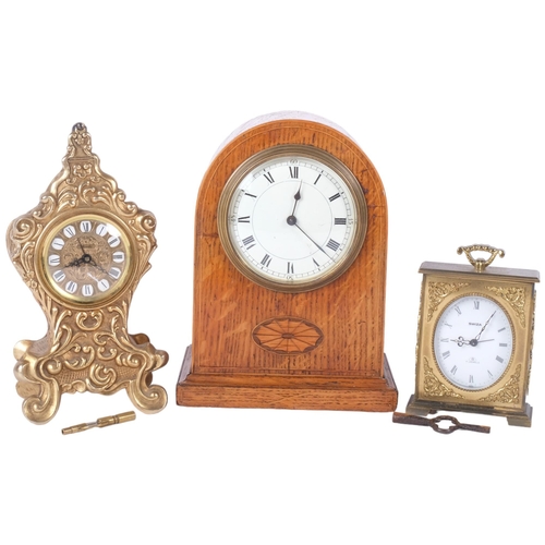 851 - An Edwardian oak 8-day mantel clock, a Swiza 8-day clock, and a gilt-metal mantel clock with enamell... 