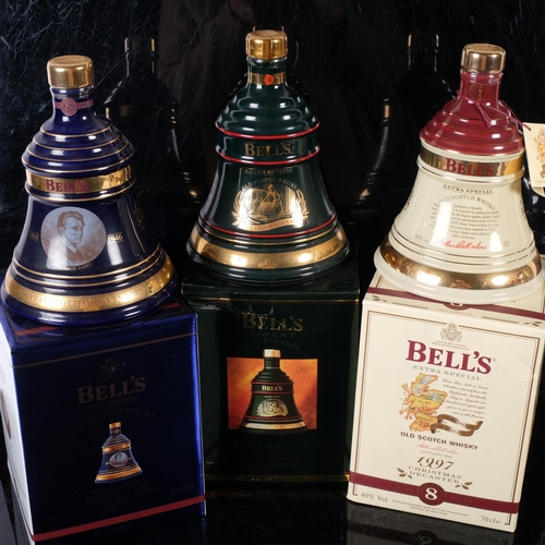 856 - 3 boxed Bell's commemorative Whisky decanters, including Christmas decanter (all full)