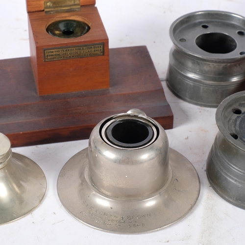 858 - A collection of early 20th century inkwells and desk stands, including pewter, Capstan type, etc (7)