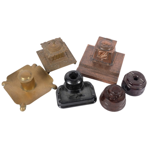 859 - A collection of various desk-top inkwells, including an Art Nouveau hammered copper example, 2 brass... 