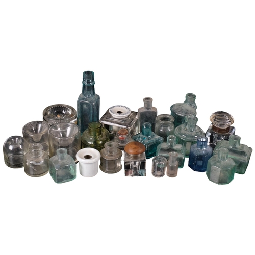 861 - A collection of Antique and other glass inkwells and bottles