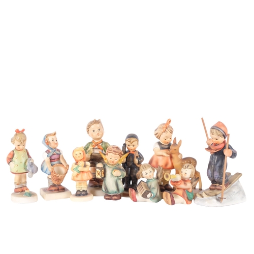 929 - A group of Goebels Hummel figures, including girl with deer, H13cm