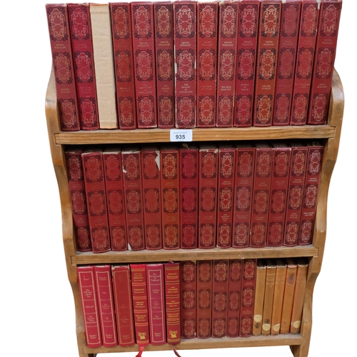 935 - A pine bookcase containing a collection of Dennis Wheatley books, distributed by Heron books, circa ... 