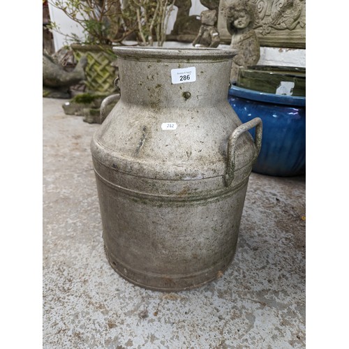 286 - Three various milk churns. Tallest 67cm.