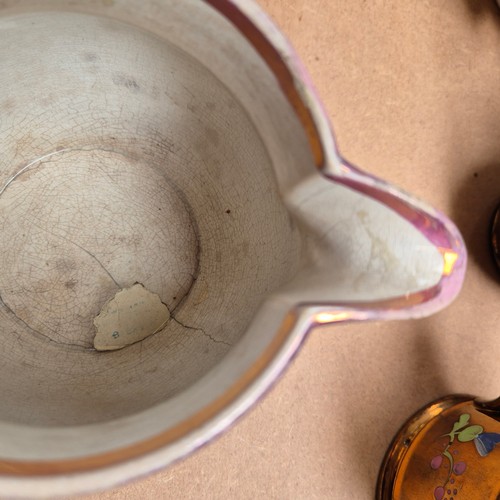 841 - A group of various lustre ware ceramic jugs, floral motifs and decoration, largest height 19cm (5)